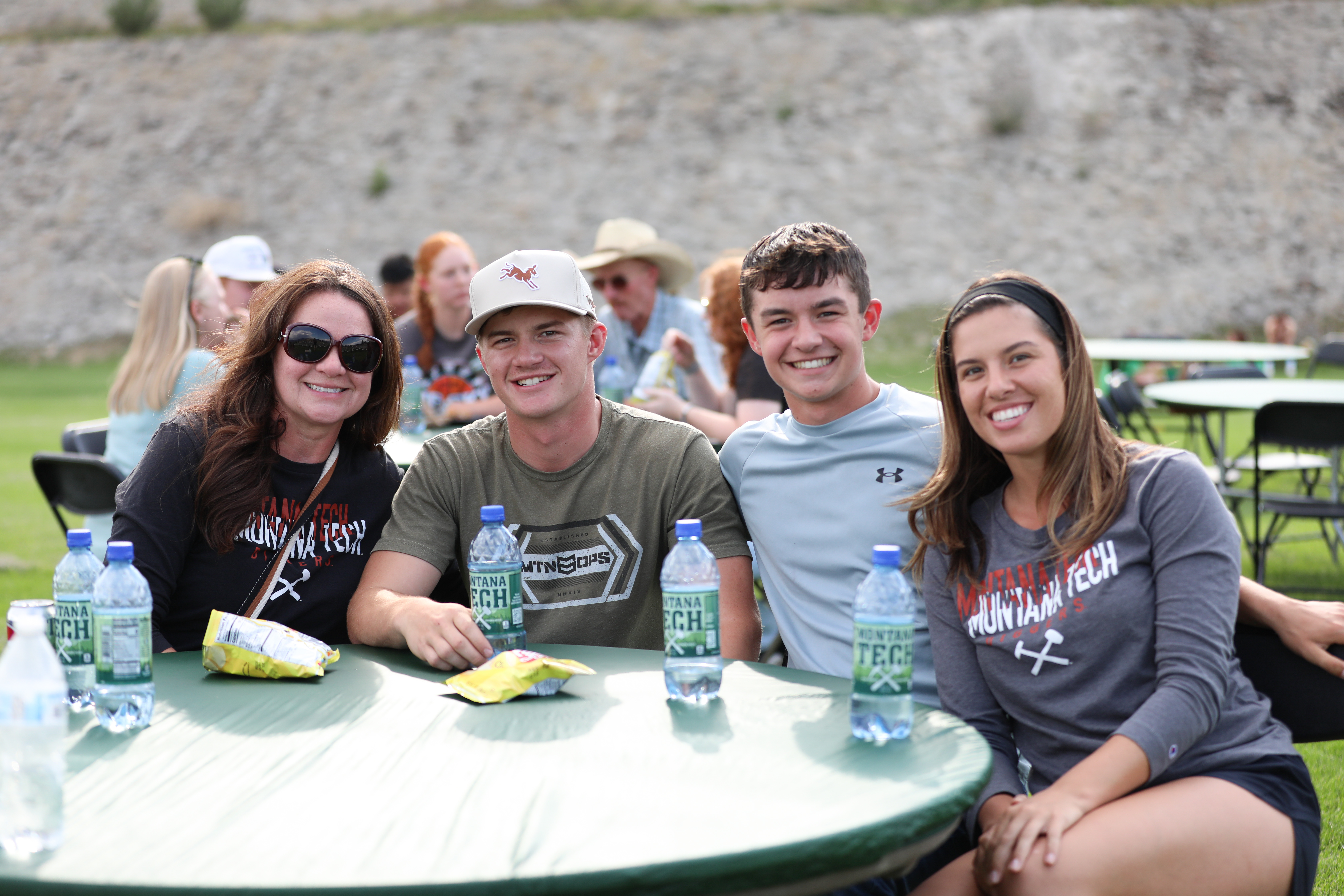 students sitting around the table in orientation. 