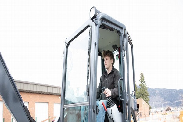 Hand operating vehicle joystick