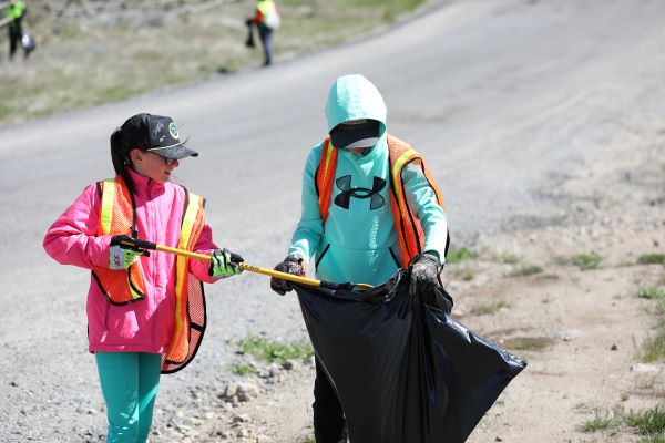 Students pick up trash.