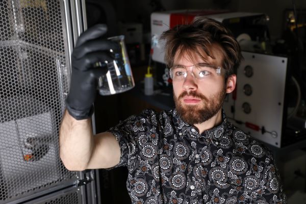 Trevor Russell works in a lab. 