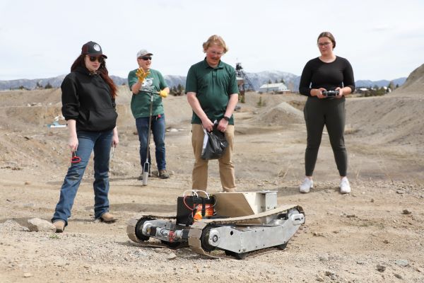 Students with a ground drone