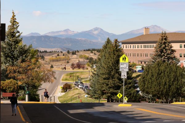 Campus on a fall day with mountains in the background