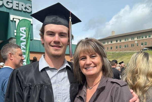 Matthew and Dawn Ingersoll pose for a photo at graduation. 