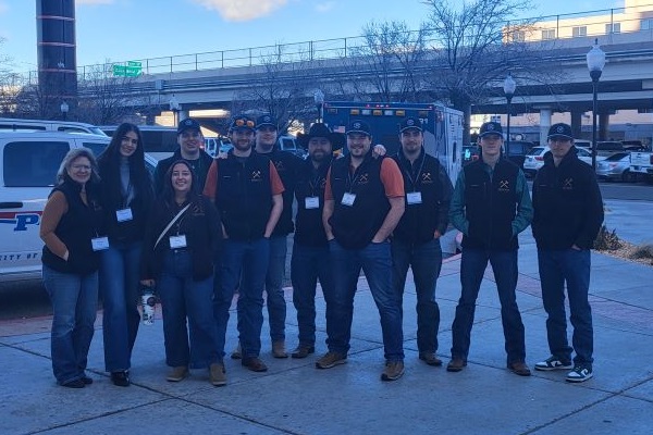 A group of students poses for a photo