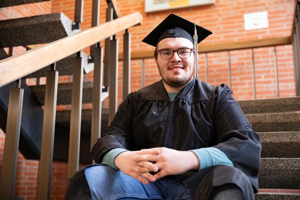 !Cein in his cap and gown