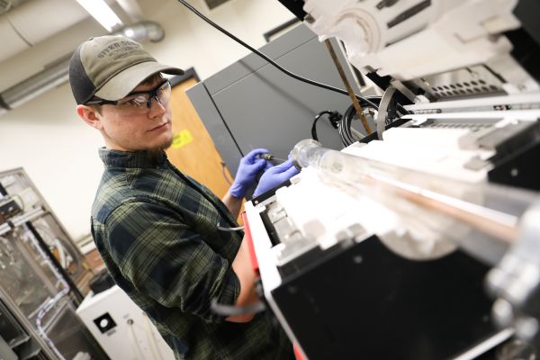 Students work in a lab. 