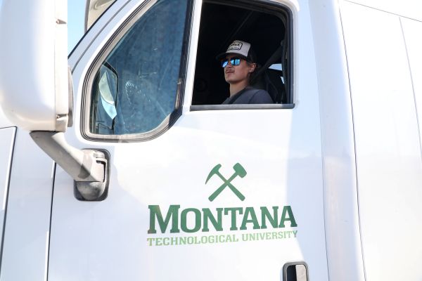 A student drives a commercial vehicle