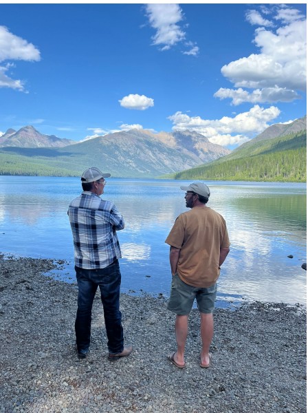 Team members look out over Kintla Lake. 