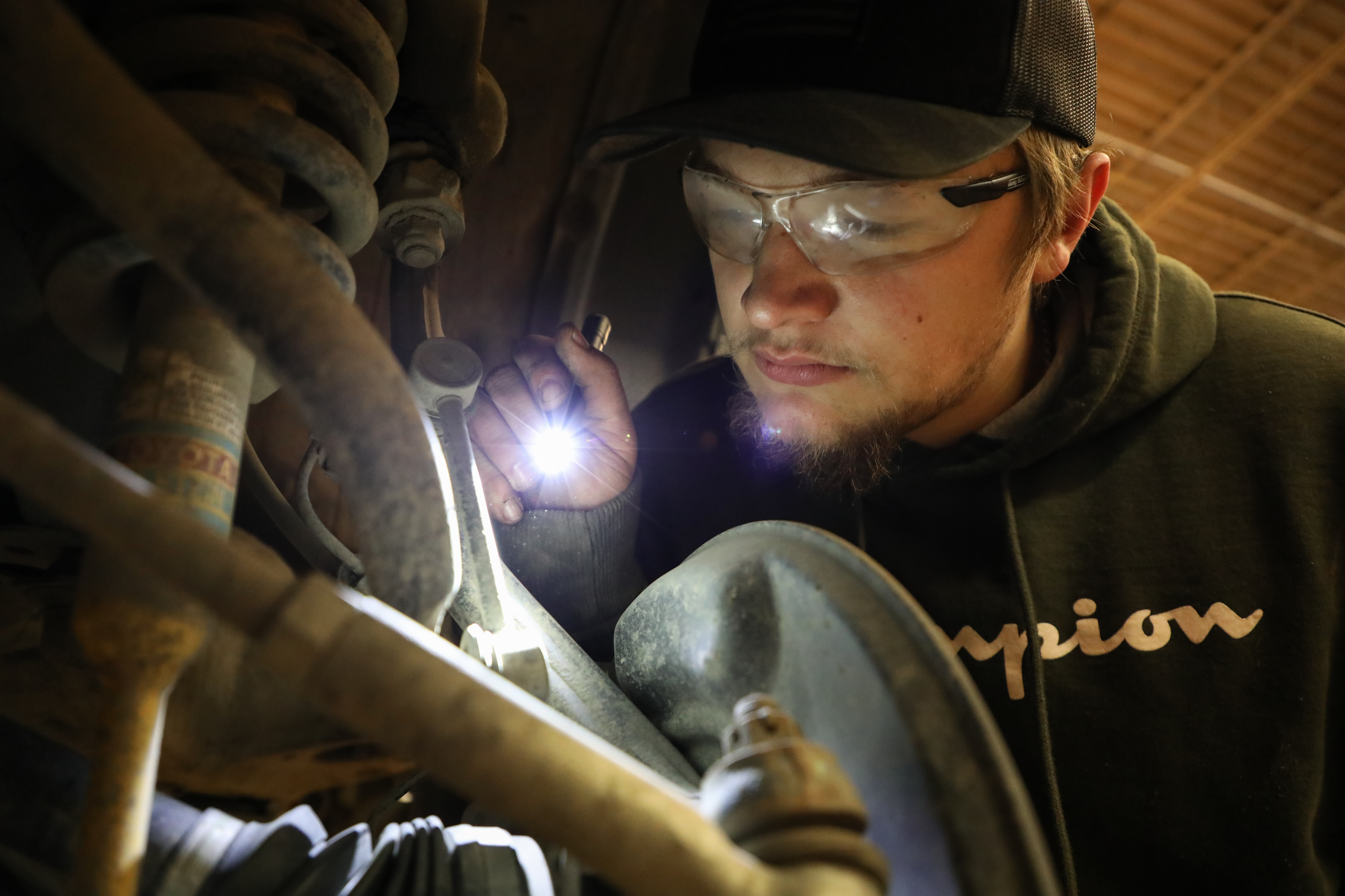 A student works in the automotive technology lab