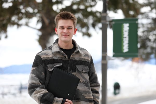 !Luke Martin poses for a photo on campus