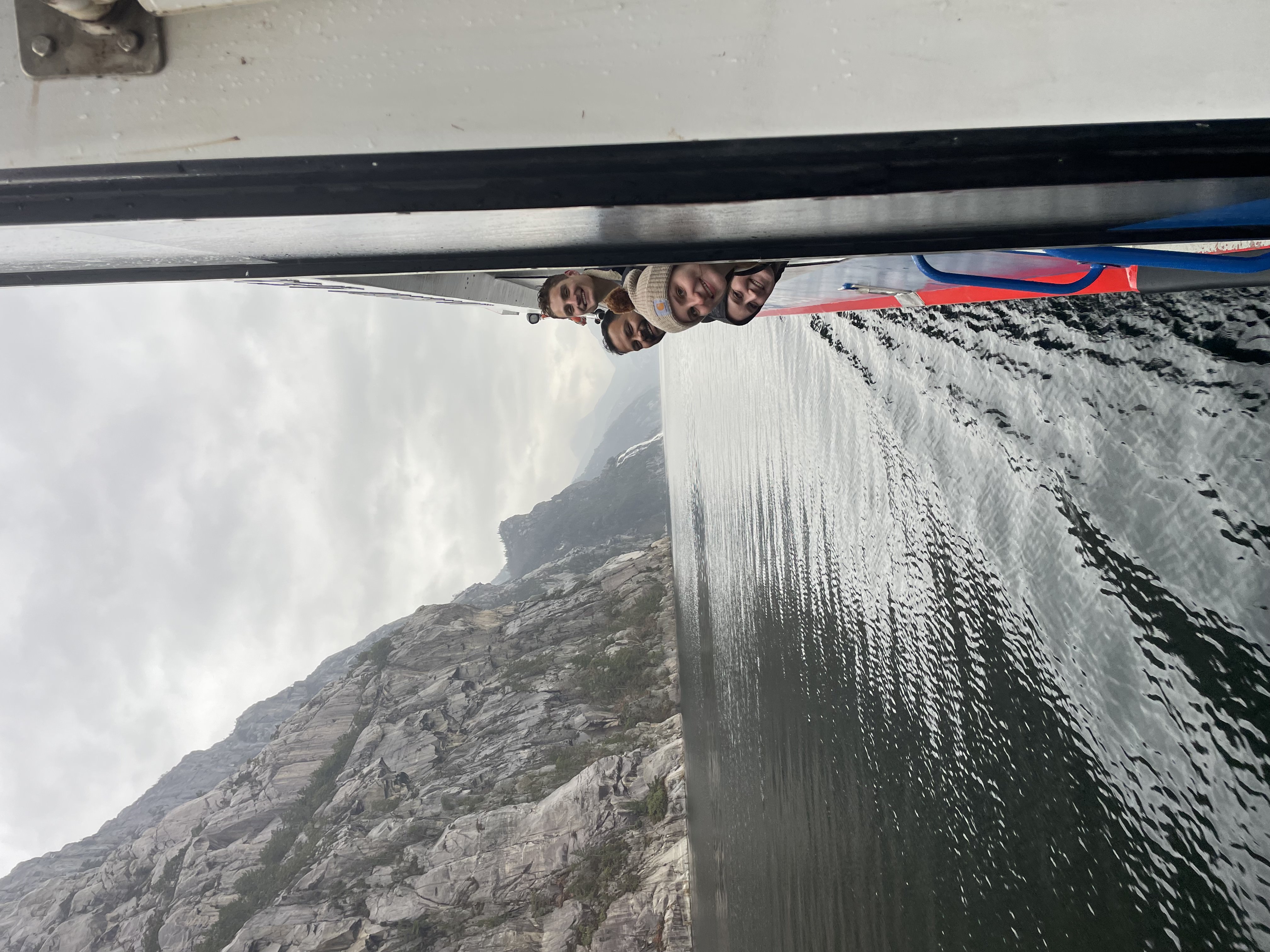 Students on a cruise boat in a fjord